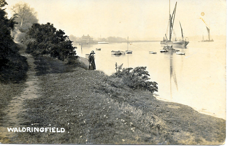 Sailing barges at anchor off the beach at Waldringfield on the River Deben in nineteenth century.