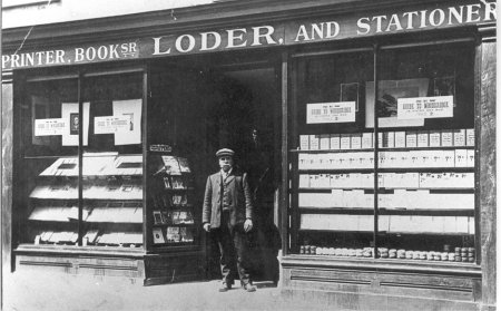 John Loder II standing outside his shop